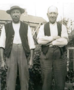 Picture of two men in waistcoats