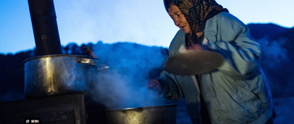 Picture of Roma woman cooking