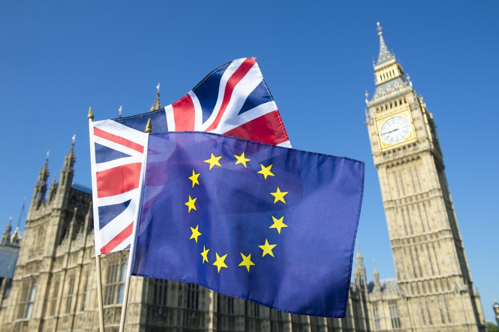 Picture of British and European flag in front of Big Ben