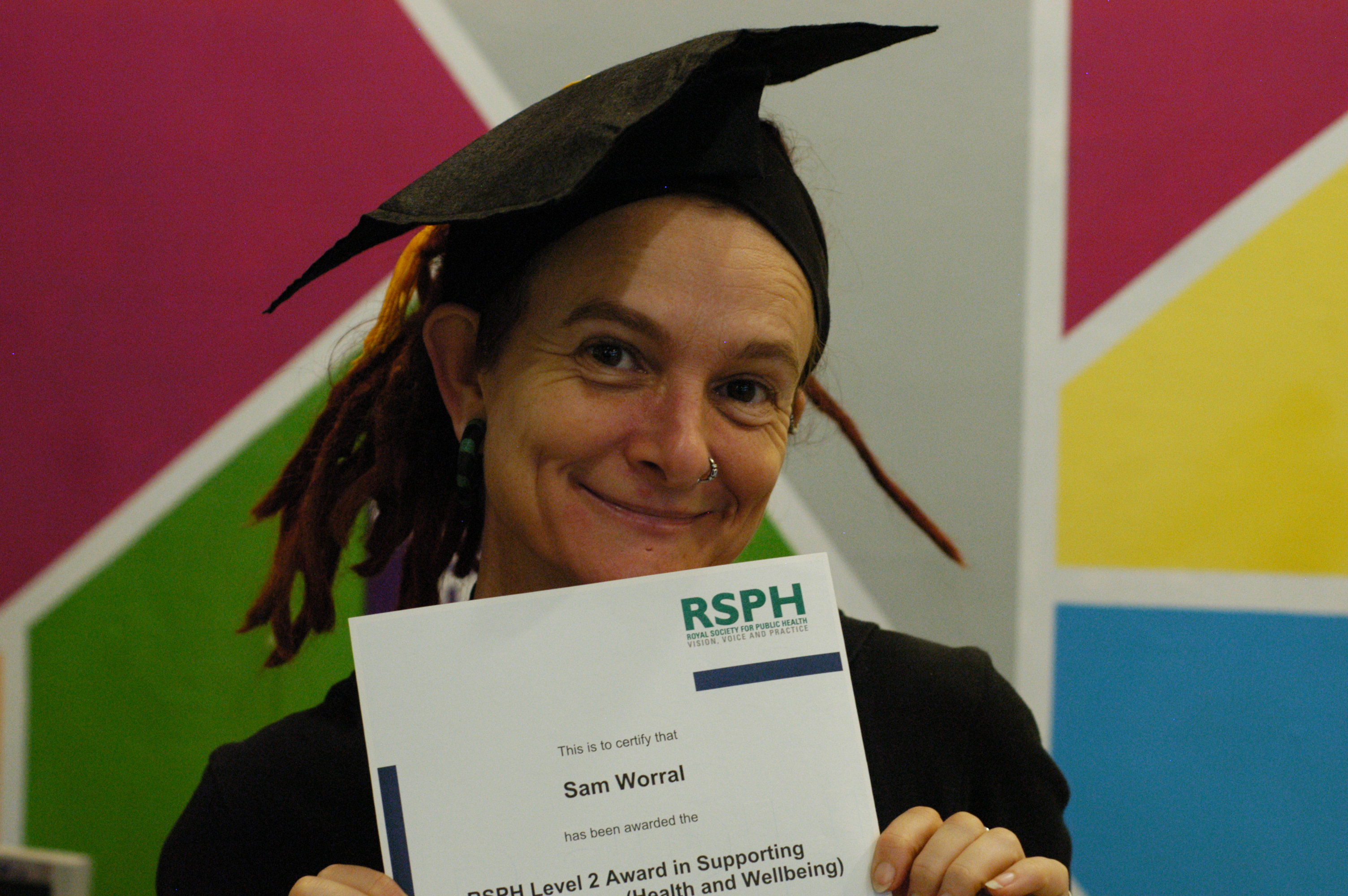 Picture of Sam Worral with RSPH certificate