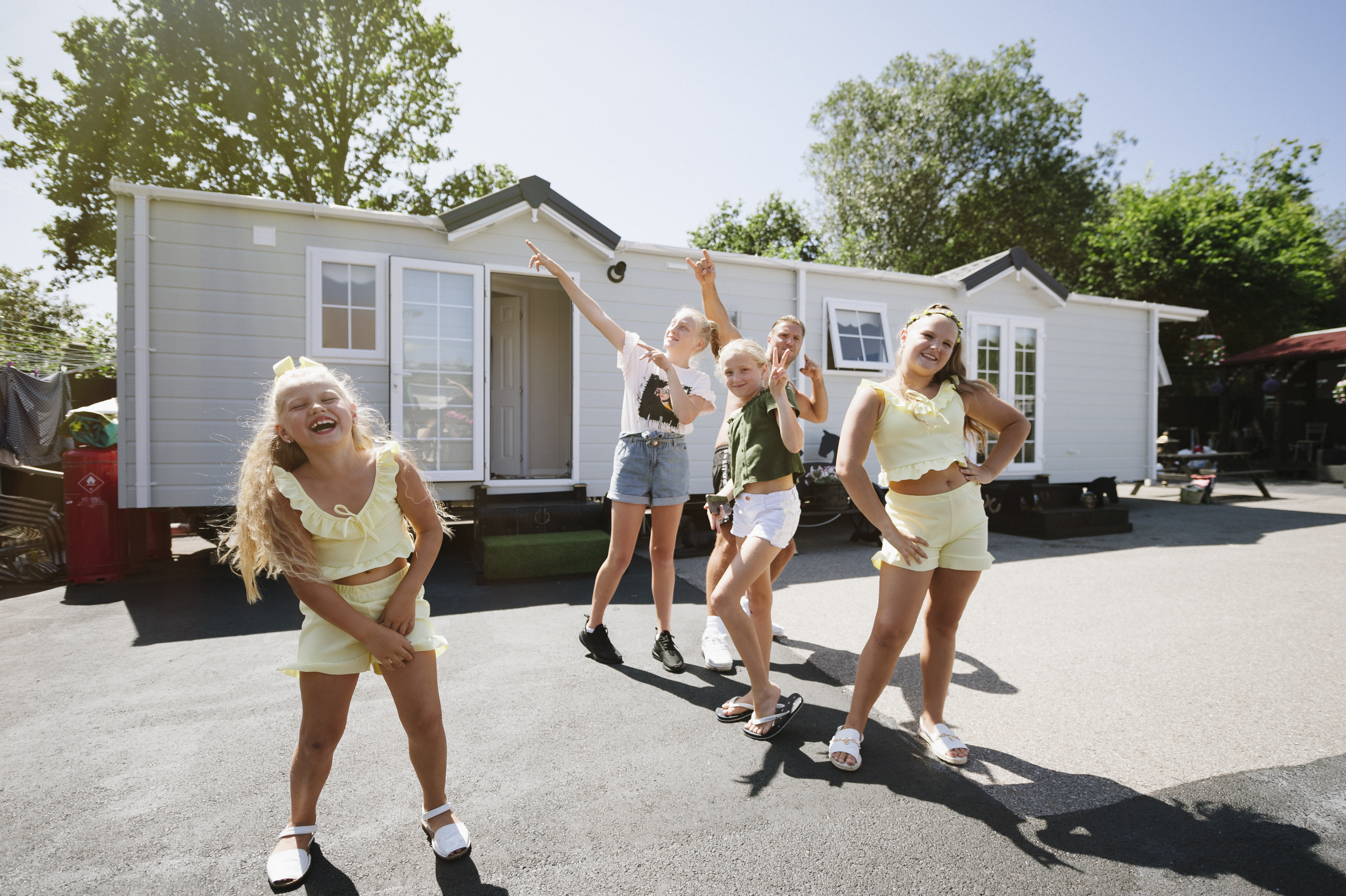 Picture of kids posing and laughing on a site