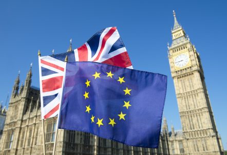 Picture of British and European flag in front of Big Ben